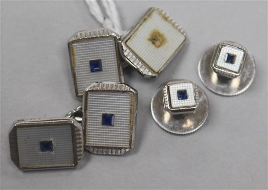 A pair of 9ct white gold, mother of pearl and gem set cufflinks and a pair of dress studs ( one stone missing).